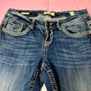 Vigoss women flared blue jeans. NWOT. Size 16. Boot cut.